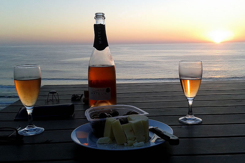 Enjoying an aperitiv on the Dream View House terrace at sunset